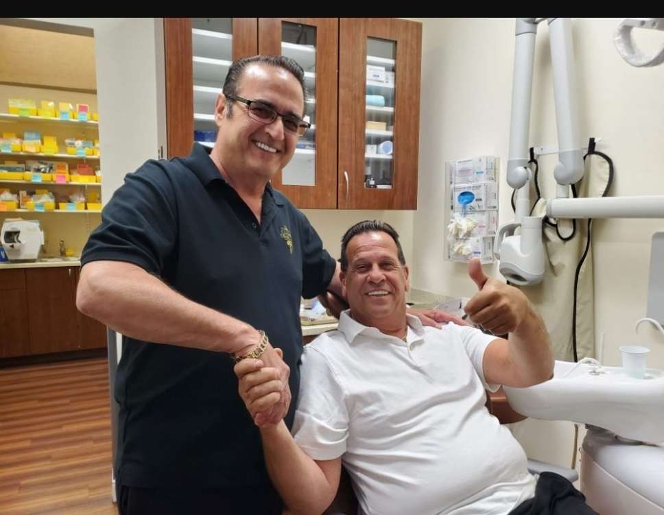 Dr. Spiros Karas with a patient at Classic Dental Arts in Manalapan, New Jersey.