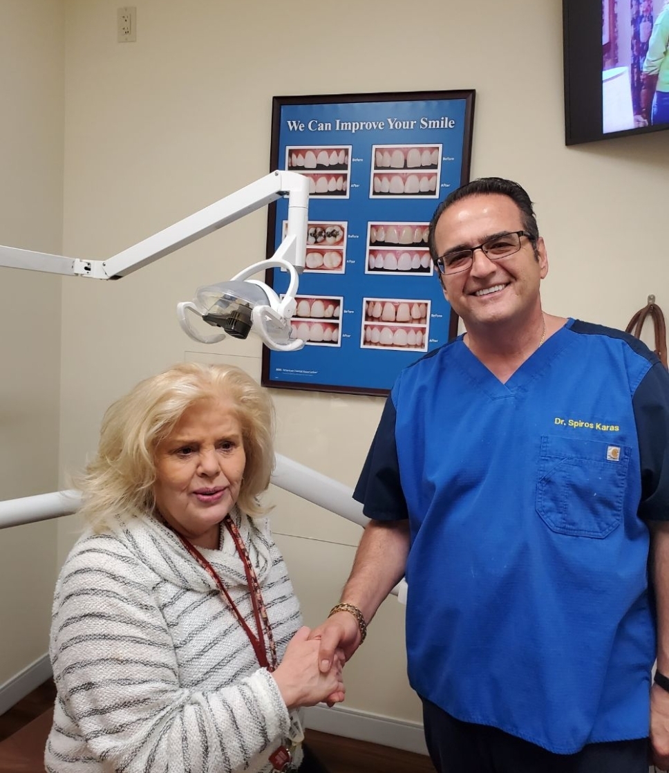 Dr. Spiros Karas with a patient at Classic Dental Arts in Manalapan, New Jersey.