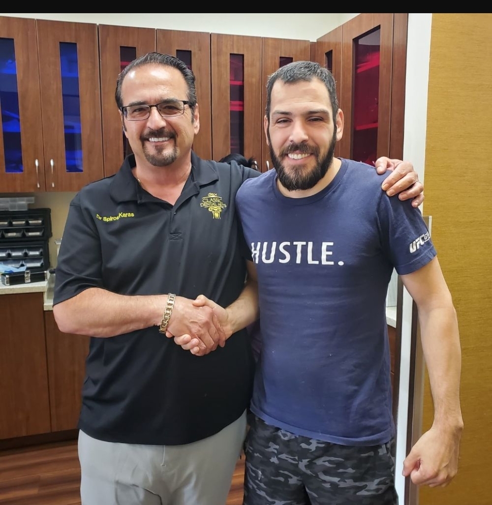 Dr. Spiros Karas with a patient at Classic Dental Arts in Manalapan, New Jersey.